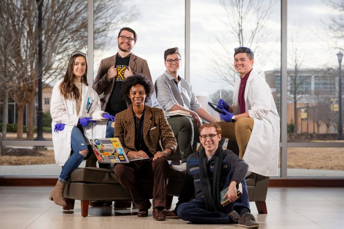 KSU Surges Forward This photoshoot for KSU magazine features students that are presenting at the 2019 NCUR conference. This group photoshoot took place in the Bagwell education building.