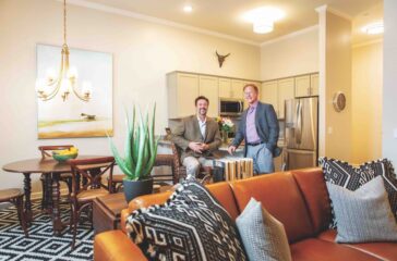 Al Holbrook (right) and Dan Needle, inside one of the homes in the new Holbrook Life Acworth development.