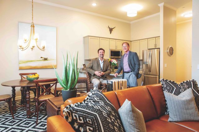 Al Holbrook (right) and Dan Needle, inside one of the homes in the new Holbrook Life Acworth development.