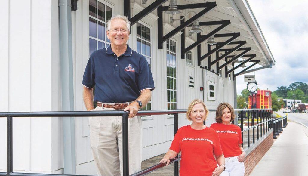 Acworth Mayor Tommy Allegood with Kim Wigington (center), chairperson, Acworth Downtown Development Authority; and Malinda Howe, chairperson, Acworth Tourism Bureau Authority. Photos: LaRuche Creative