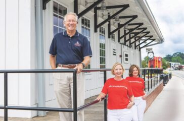 Acworth Mayor Tommy Allegood with Kim Wigington (center), chairperson, Acworth Downtown Development Authority; and Malinda Howe, chairperson, Acworth Tourism Bureau Authority. Photos: LaRuche Creative