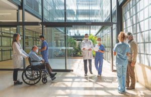 How Local Health Providers Are Making Healthcare Safe People walking in and out of the hospital - Healthcare concepts