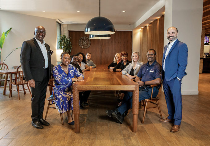 DoubleTree Is All About the Upgrade Pictured left to right going around the table: Gregory Brown, General Manager; Alicia Smith, Accounting Manager; Lamin Sarr, Executive Chef; Cerissa Stewart, Convention Services Coordinator; Omar Mendoza, Executive Housekeeper; Robin Snyder, Controller; Mai Jallow, Director of Human Resources; Wendy Jettmar, Corporate Sales Manager; Andre Hill, Chief Engineer; and Paul Woodley, Director of Sales.