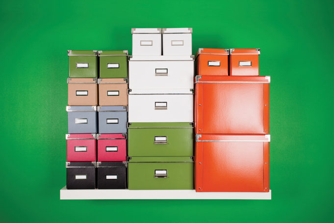 Getting Organized wall shelves with cardboard boxes