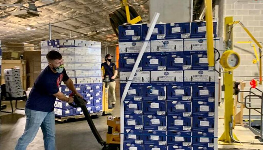 Tyler Holley of the Atlanta Braves Foundation unloading food for the Fleet to be refrigerated prior to pick-up at Truist Park.