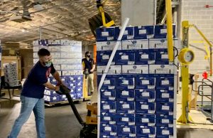 Cobb Community Food Fleet Comes to an End Tyler Holley of the Atlanta Braves Foundation unloading food for the Fleet to be refrigerated prior to pick-up at Truist Park.