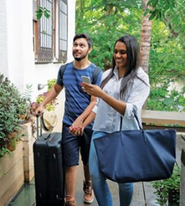 Young Couple Traveler Arrival at Accommodation - Bed and Breakfast or Hostel / Hotel