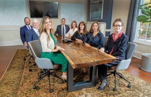 Wickham Financial & Insurance Services Takes A Total Approach to Wealth Management The Wickham team, pictured left to right and front to back: Iris Turner, Agent; Michael Beecher, Advisor/Agent; Jeremy Cronemeyer, Operations Manager; Debbie Alfonsi, Admin/Customer Support; Siley Vaia, Ops Mgr/Commercial Customer Support; Susanne Wickham-Cook, Personal/Commercial Lines Agent; Stacey Scott, Marketing and Client Relations; and Graham Wickham, President/CEO.