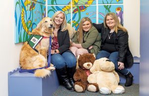 Against All Odds—Sharing Our Success Left to right: SafePath Community Service Dog, Glinda; Investigator Monika Franklin; Hannah Schiltz; and Sarah Schiltz.