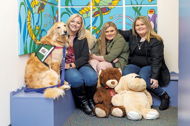 Left to right: SafePath Community Service Dog, Glinda; Investigator Monika Franklin; Hannah Schiltz; and Sarah Schiltz.