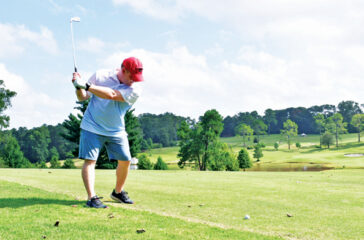 Golfer taking a swing