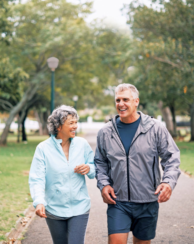 Shot of a senior couple out for a walk in the park