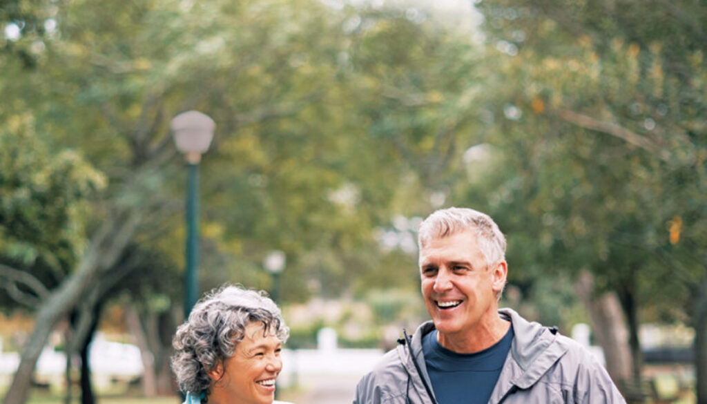Shot of a senior couple out for a walk in the park