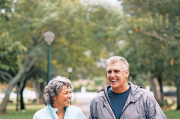 Shot of a senior couple out for a walk in the park