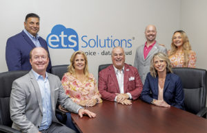 People With A Passion Pictured left to right: Managing Partner Thomas Collie III (seated), Client Experience Specialist Sal Thomas, Vice President Amy Russell, President Mike Russell, Technology Consultant Adam Clark, Client Development Manager Emily Snyder, and Strategic Advisor Kylah King (seated).