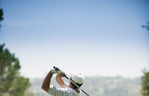 3rd Annual MBA Golf Tournament Tees Off On Oct. 20 A golfer at the end of his golf swing.