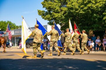 Soldiers marching in a Veteran's Day parade.