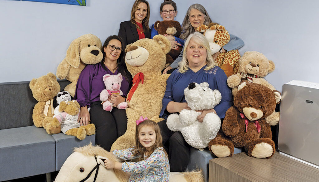 Pictured L-R from the top: Claire Kirkland, LCSW, Director of Intervention Services; SafePath CEO Jinger Robins; Pam Martin, Director of Finance; Tiffany Webb, Director of Services; and Gail Garland, Director of Advocacy. The girl is not a client.