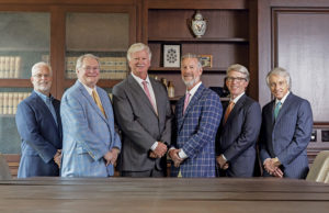 40 Years And On… From left to right: Moore Ingram Johnson & Steele attorneys Phillip Beggs, William (Bill) Johnson, Robert Ingram, Matthew Howard, Kevin Moore, and Steve Steele.