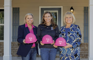 Building A Dream For Cobb Women L to R: Women Build Co-Chair Stacey Chapman, Habitat NWMA CEO Jessica Gill, and Women Build Co-Chair Kim Gresh.