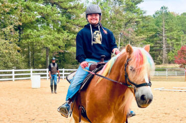 Hippotherapy — a therapy method that incorporates the movement of a horse to improve motor and sensory functions of the rider.