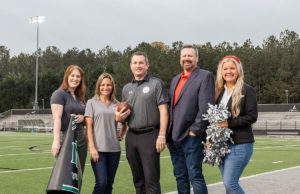 Beyond Banking L-R Felicia Wagner, Executive Director, Cobb schools Foundation; Michelle Dobbins, Vice President of Marketing, Credit Union of Georgia; Don Baker, Director of Athletics, Cobb County School District; Brian Albrecht, President/CEO, Credit Union of Georgia; Amanda Arnold, Director of Community Outreach, Credit Union of Georgia.