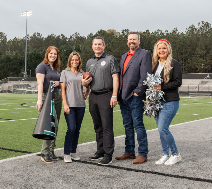 Beyond Banking L-R Felicia Wagner, Executive Director, Cobb schools Foundation; Michelle Dobbins, Vice President of Marketing, Credit Union of Georgia; Don Baker, Director of Athletics, Cobb County School District; Brian Albrecht, President/CEO, Credit Union of Georgia; Amanda Arnold, Director of Community Outreach, Credit Union of Georgia.