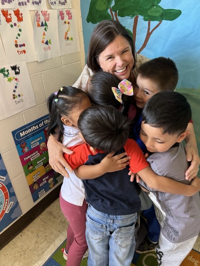 Shari and Little School kids Cobb Community Foundation's Shari Martin