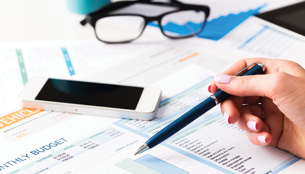 Investment charts business report. Still life in office