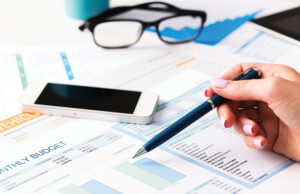 Everything You Wanted To Know About SBA 7(a) Loans (But Were Afraid to Ask) Investment charts business report. Still life in office